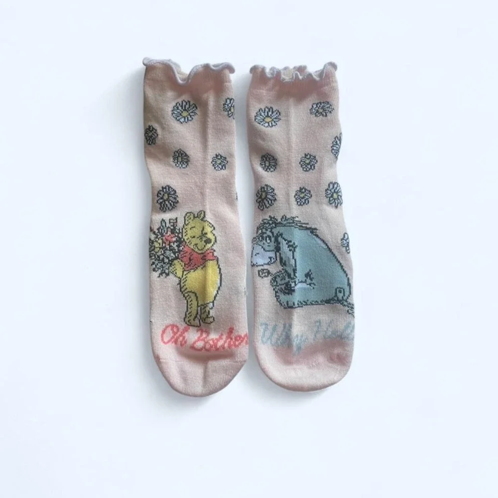 Winnie the Pooh and Eeyore socks by Disney